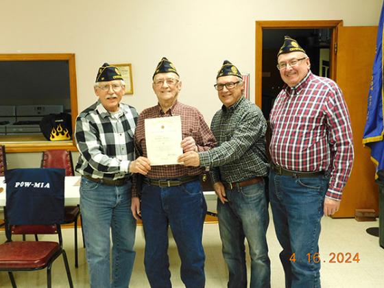 Presenting this Distinguished Certificate, from left, Dennis Brozak (Finance Officer), Tony Albarello, Frank Siewiorek (Post Commander) and Frank Nowak (1st Vice Commander). (Submitted Photo)