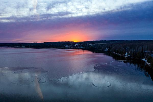 A partially frozen Sunset Lake.