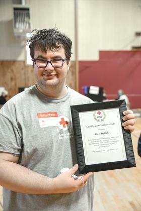 A Certificate of Achievement was presented to Blaze Rybicki in recognition of his outstanding support and dedication to the American Red Cross Blood Program in the Iron River community through both volunteering and donating blood. Rybicki is a West Iron County senior. He has volunteered with the Red Cross for over three years and has worked over 20 blood drives in the area.