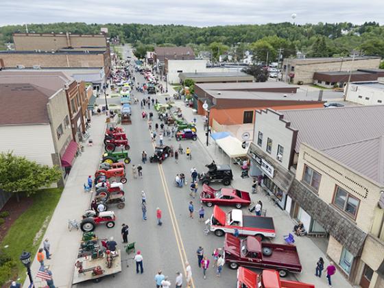 Kevin Zini captures a drone shot of a buzzing Genesee Street for the 44th annual Father’s Day Car Show which took place on June 19. The car show is sponsored by the Classic Farm Machinery Club of Iron County. (Photo by Kevin Zini)