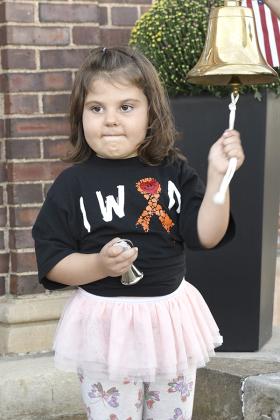Preslie and her family gathered around on Sept. 19 for a local ringing of the bell to symbolize her beating cancer.  She had her official bell ringing in Milwaukee at the Children’s Hospital on Sept. 12. (submitted photo)