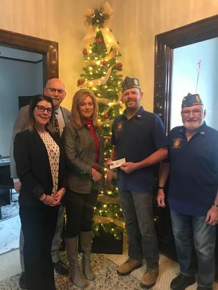 Pictured are from left, Cathy Peruzzi (Thrivent), James Quayle (Thrivent), Nikki Hebert (Keller Williams UP), Danny Fitzpatrick (American Legion Reino Post 21), Jim “Butch” Testini (American Legion Reino Post 21), Not Pictured: Lisa Franzene (Flagstar). (photo by Wendy Graham)