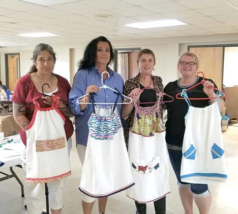 Participants created dresses out of pillowcases to be placed in Samaritan Ministries worldwide shoebox ministry. Shoeboxes have been delivered to more than 170 countries over the years.