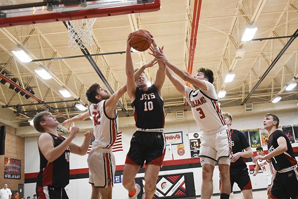 The North Central Jets get a taste of tough defense during the Trojans game.