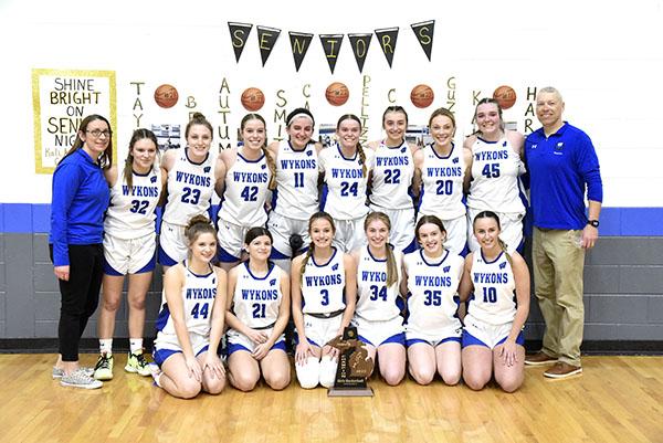 Lady Wykons won the district championship. Pictured are, front row from left, Julia Swenski (44), Taylor Bett (21), Seanna Stine (3), Autumn Smith (34), Rowyn Fiszer (35), Kya Dallavalle (10). Back row from left, Connie Smith (JV Coach), Kaitlyn Smith (32), Laycee Parson (23), Lacey Shamion (42), Kali Harty (11), Danica Shamion (24), Calli Pellizzer (22), Carli Guzowski (20), Sidney Storti (45) and Eric Shamion (Varsity Coach). (Photo by Kevin Zini)