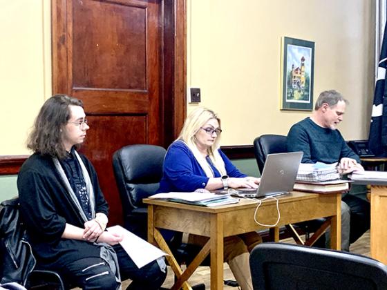 Forest Park senior Quinn Illis (left) joins Crystal Falls City Clerk Tara Peltoma (center) and Crystal Falls City Manager Gerard Valesano (right) at the City Council’s February meeting. (submitted photo)