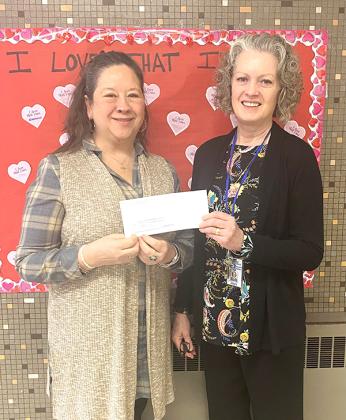 Pictured are, Kathlene Long (Museum Director) and Heidi Priestley (Stambaugh Elementary School Principal). (submitted photo)