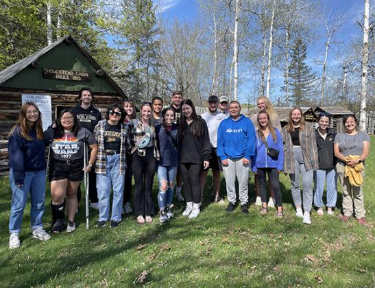 Pictured are, Professor Marisol Sepulveda along with Aquatic Sciences students from Purdue University at the Iron County Museum. (submitted photo)