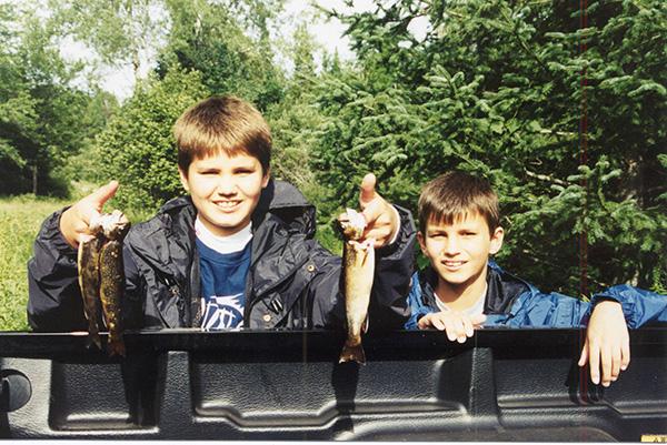 Brothers James and Jeff Pepin, children of the author and from left to right respectively, pose for a picture taken with some small trout they caught.