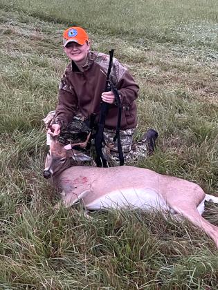 Carson Schmit happy with his buck.