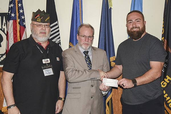 Thank you to Dr. Danny Yarger for his generous donation to The Veterans of Foreign Wars Veterans Emergency Relief Fund.  Pictured are, from left, Jerry Williams (Post Service Officer), Dr. Yarger presenting a check to Kyle Manzoline (Commander of VFW Ottawa Post 3134). Any veterans needing assistance, please contact the Post or the Iron County Veterans Service Office at 906-265-3819