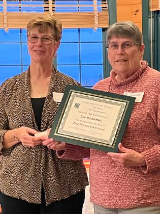 Pictured are, Carol Callovi 4-H council member presenting Sue Passamani with the Friends of 4-H award. Submitted photo.