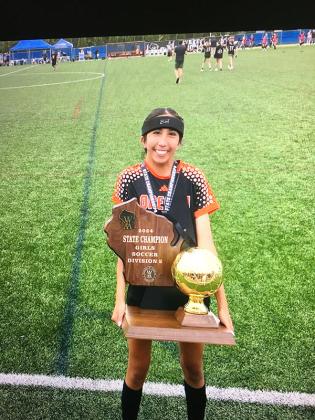 Ava Butsic, daughter of John and May Butsic, playing for Oregon High School in Wisconsin soccer team won the 2024 State Champion Girls Soccer in Division 2. Ava plays mid-fielder and is now a junior in high school. Ava is the granddaughter of Jim and Colleen Butsic of Iron River. (Submitted photo)